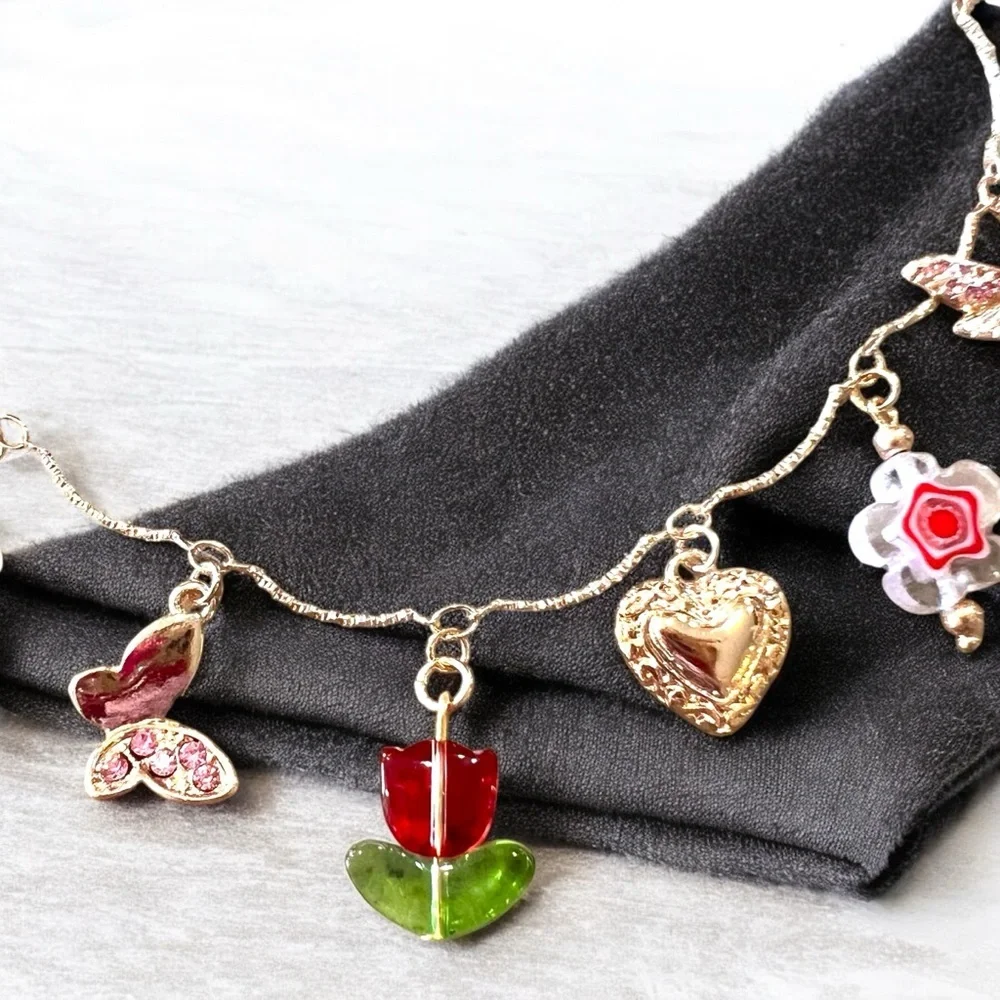 Gold and Red toned Charm Necklace glass rhinestones enamel tulip flower hearts